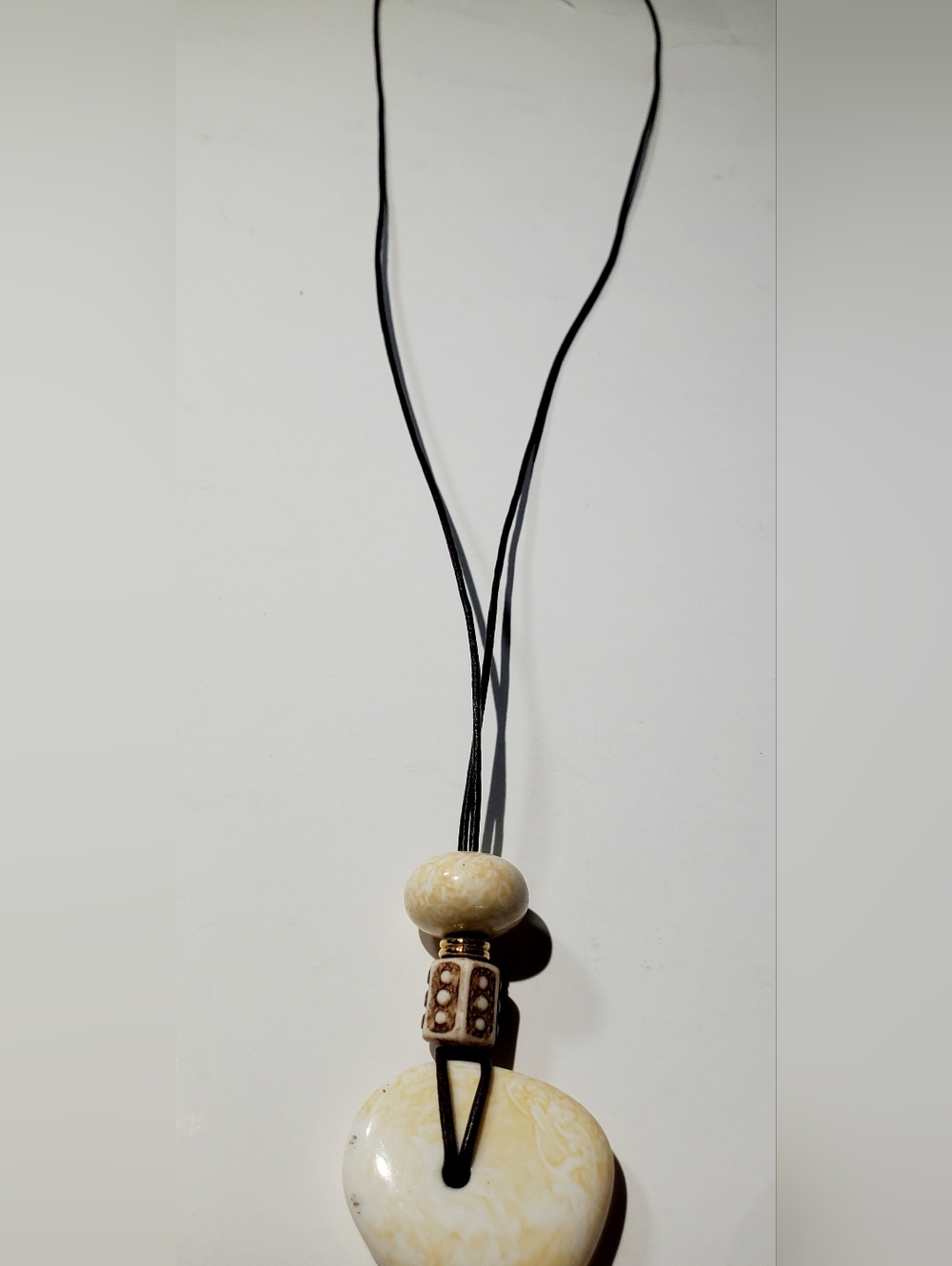 Handcrafted Cream Bead Pendant Necklace with Black Cord
